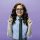 ginger-lady-in-eyeglasses-and-shirt-pointing-up-on-M4QZJLL-4.jpg